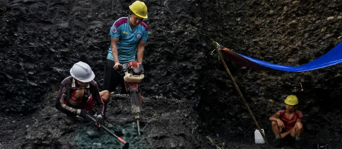 Freelance miners use jackhammers to search for jade in a Myanmar mine. Image by Hkun Lat. Myanmar, 2020. Freelance miners use jackhammers to search for jade in a Myanmar mine. Image by Hkun Lat. Myanmar, 2020.
