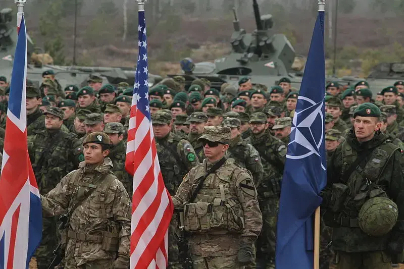 Amid rising tensions with Russia, soldiers from several NATO countries gather for training exercises in 2014. Image courtesy of Staff Sgt. Keith Anderson. Lithuania, 2014. NATO training