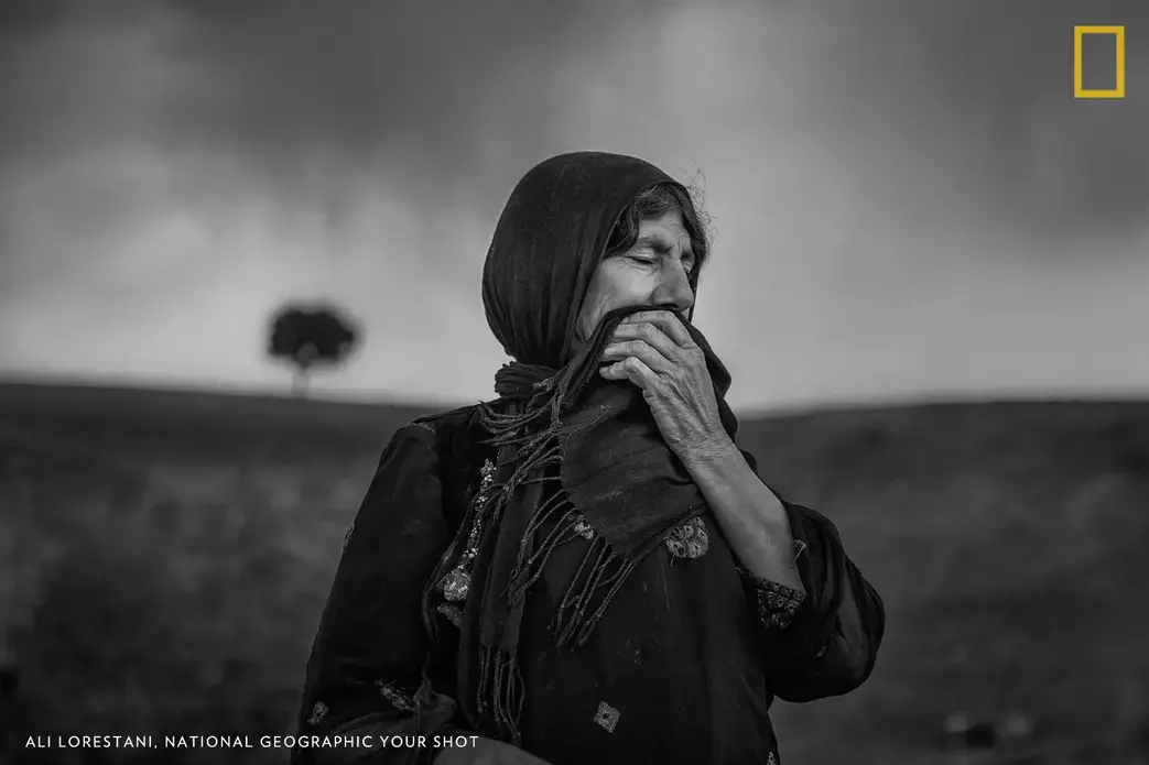 A Kurdish woman with anxiety, sadness, hope… full of life.  She has no way, no other choices. She has to continue and look forward to something. She has a treasure called hope. Image by Ali Lorestani.<br />
