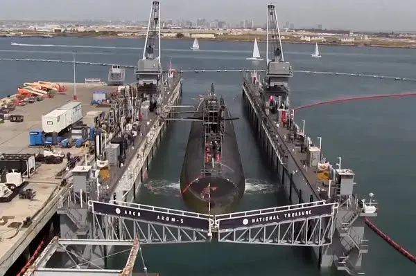 Naval historian Norman Polmar says buying new nuclear-armed submarines is necessary to replace the aging ones in today's arsenal, but not in as many numbers as the Navy plans. Still frame from PBS NewsHour broadcast. 2015. Media file: unnamed.jpg