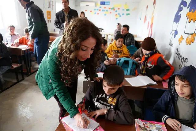 Getting refugee children through school is difficult, but chances of attending university are slim. Image courtesy of DFID / CC BY 2.0. Jordan, 2015. Getting refugee children through school is difficult, but chances of attending university are slim. Image courtesy of DFID / CC BY 2.0. Jordan, 2015.