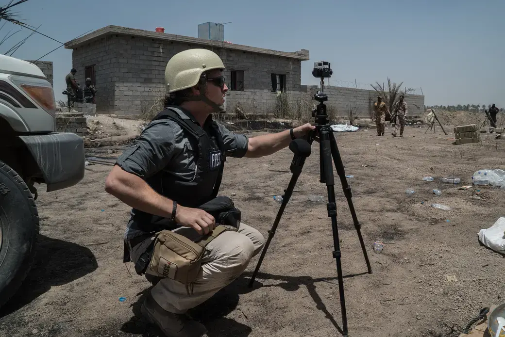 Ben C. Solomon filming in Iraq. Image courtesy of New York Times. Iraq, 2016. Ben C. Solomon filming in Iraq. Image courtesy of New York Times.