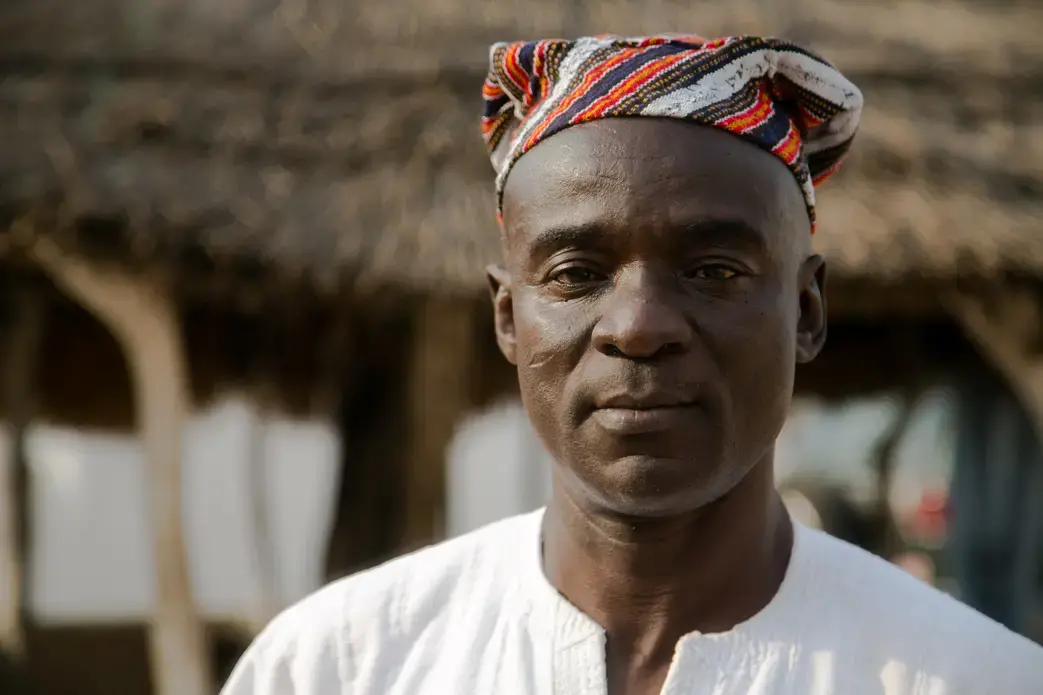 Chief Ubor Dawuni Wumbe in his palace in Bunbong. Image by Noah Fowler. Ghana, 2017.