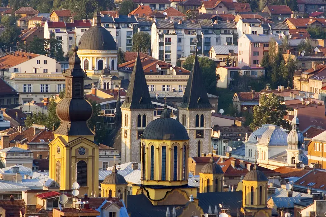 project page image Media file: sarajevo-rooftops-with-catholic-and-orthodox-cathedrals_charles-bowman_getty_cs.jpg