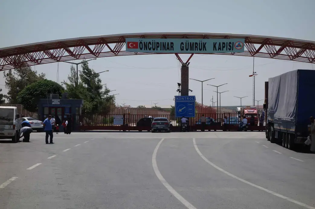 The border crossing near Kilis. Officially, Turkey’s borders are open to all Syrians. But both NGOs and refugees accuse Turkey of limiting entry. And even the Turkish government acknowledges there are tens of thousands of people living in camps on the Syrian side of the border. Image by Hugh Eakin. Turkey, 2013. Media file: roth_turkey_2_0.jpg