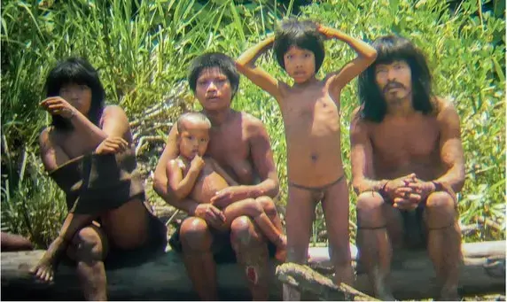 Members of Peru's isolated Mashco Piro tribe have frequently appeared on a riverbank and encountered outsiders. Image courtesy of Science Magazine. Peru, 2015. Media file: screen_shot_2015-08-14_at_10.49.08_am.png