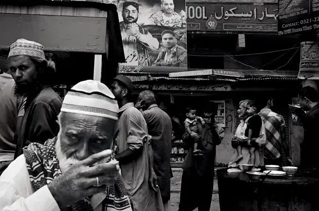 A poster of Uzair Baloch (center) and men killed by gang violence or by police in Lyari. Image by Asim Rafiqui/NOOR Images. Pakistan. Media file: 00036_asimrafiqu-harpers-1509-630.-1.png