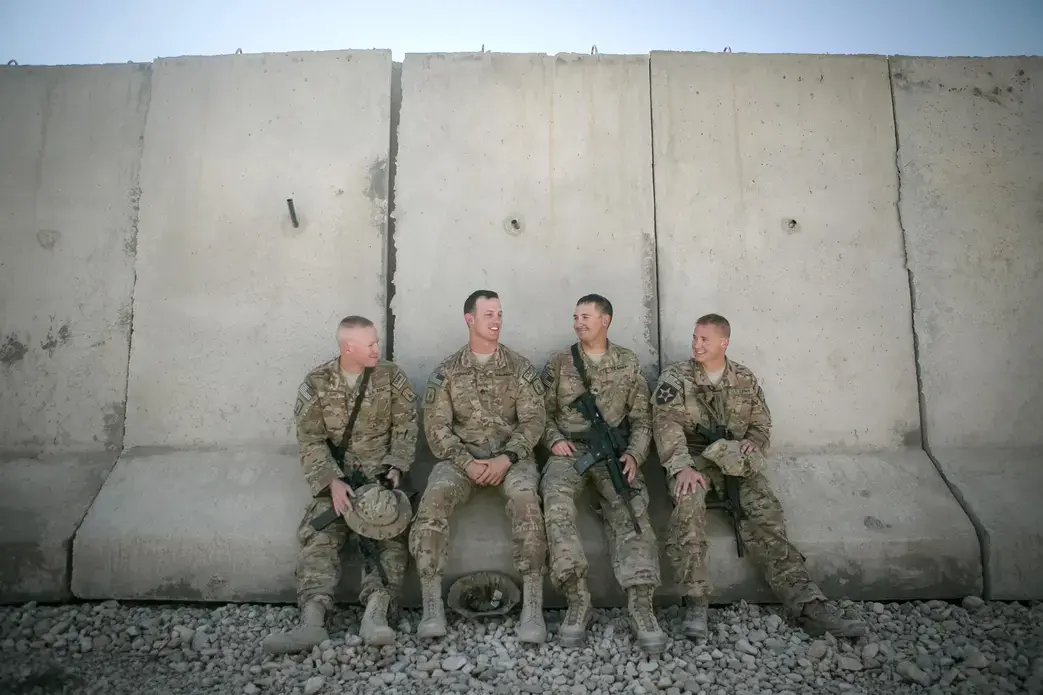 Spc. Aaron Burns of Manitowoc (from left), Staff Sgt. Anthony Steinhoff of Sun Prairie, Sgt. Justin Kundinger of Gilbert, Minn., and Sgt. Shawn Tilly of Green Bay all spent a year in Afghanistan from 2012-2013 and are back again with the Wisconsin National Guard 829th Engineer Co. at Camp Marmal in Mazar-i-Sharif, Afghanistan. Image by Meghan Dhaliwal. Afghanistan, 2014. Media file: afghanagain_1of1.jpg