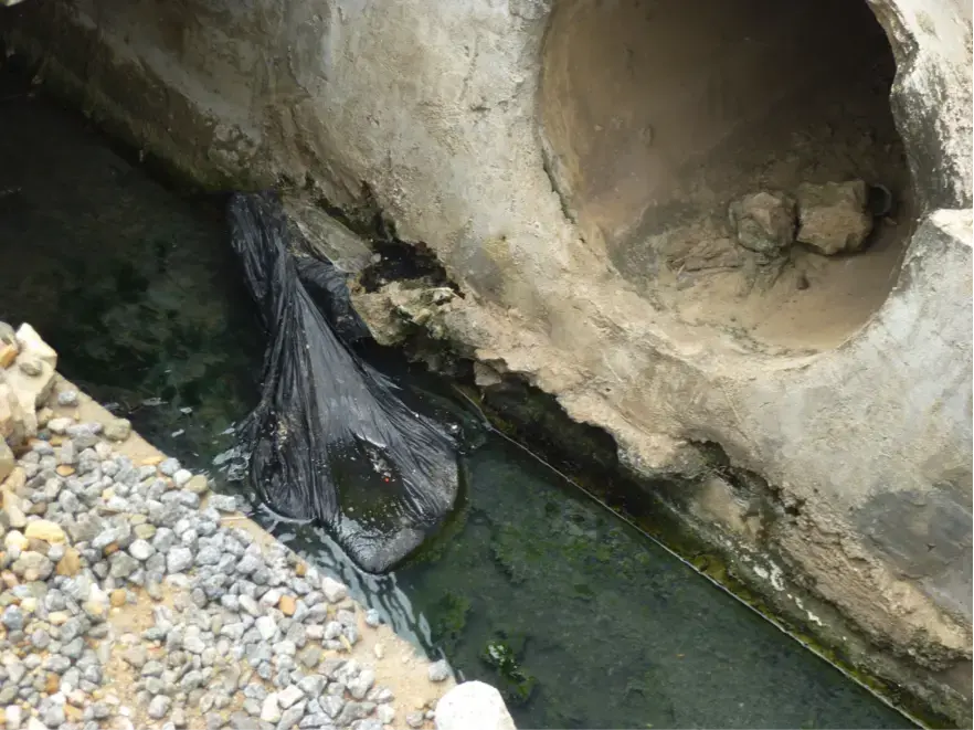 "Takeaway" is a form of open defecation whereby people relieve themselves in plastic bags, which they then dump in gutters or in trash piles. Image by Diksha Bali. Ghana, 2013. Media file: takeaway.png