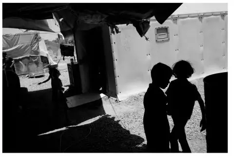 Children in an IDP camp. Image by Paolo Pellegrin. Iraq, 2016. IDP Camp