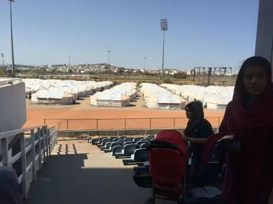 Refugees now live in long-abandoned stadiums built for the 2004 Olympics in Athens. Image courtesy of Sonia Shah. Greece, 2016. Athens refugees