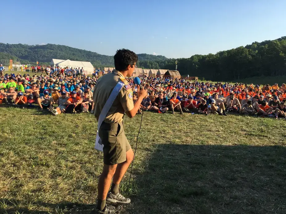 Manny Lopez, an Eagle Scout from California, talks to more than a thousand fellow scouts at Base Camp Delta about the Out of Eden Walk and the opportunity to join Paul Salopek on the trail. Image by Mark Schulte. United States, 2017. Manny Lopez, an Eagle Scout from California, talks to more than a thousand fellow scouts at Base Camp Delta about the Out of Eden Walk and the opportunity to join Paul Salopek on the trail. Image by Mark Schulte. United States, 2017.