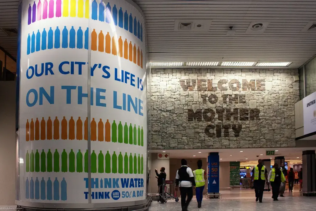 Advertisements in Cape Town encourage people to conserve water. Image by Brett Walton. South Africa, 2018. Advertisements in Cape Town encourage people to conserve water. Image by Brett Walton. South Africa, 2018.
