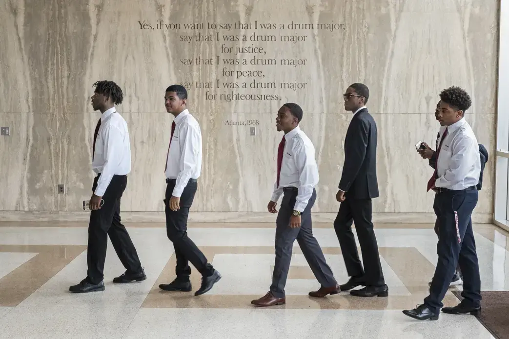 Freshmen enter the Morehouse chapel named for Martin Luther King, Jr., whose words are etched on the wall. Image by Radcliffe "Ruddy" Roye. United States, 2017.