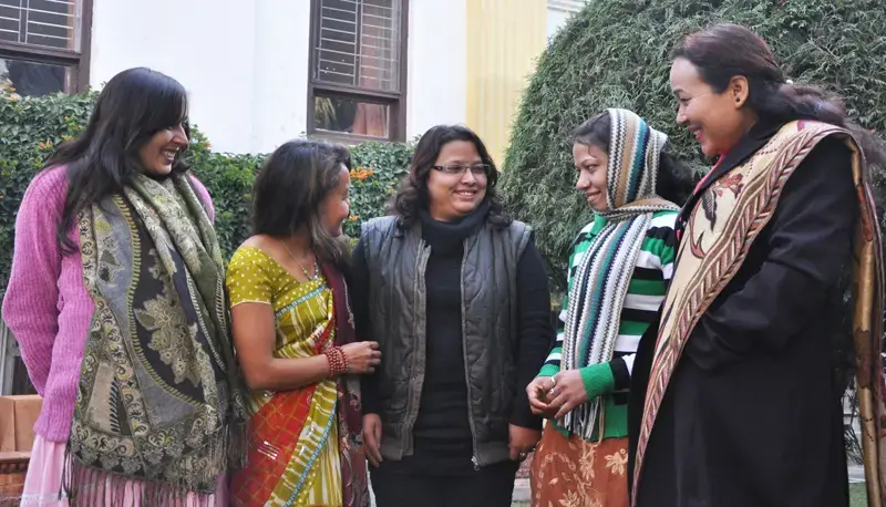 Sunita Danuwar, center, talks with women who receive rehabilitation and training at Shakti Samuha, a Kathmandu organization she helped found to help young sex-trafficking victims. Image by Anup Kaphle. Nepal, 2011. Media file: 083106_hn4.jpg
