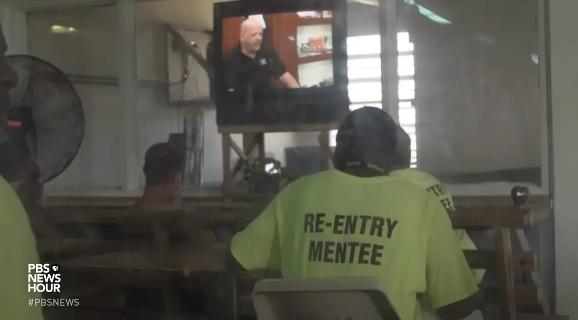 A re-entry mentee in the Louisiana state prison system. Image by PBS NewsHour. United States, 2018.