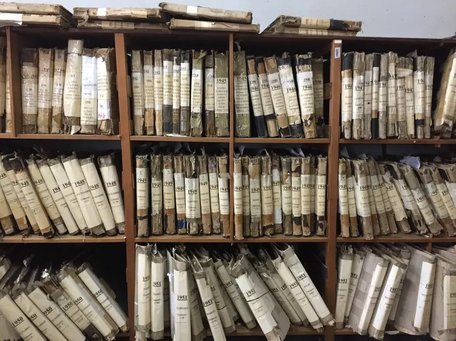 Investigators search archives all around the world looking for the names of potential perpetrators, including the crumbling ship manifests at Argentina's Hotel de Inmigrantes. Image by Linda Kinstler. Argentina, 2017. Investigators search archives all around the world looking for the names of potential perpetrators, including the crumbling ship manifests at Argentina's Hotel de Inmigrantes. Image by Linda Kinstler. Argentina, 2017.
