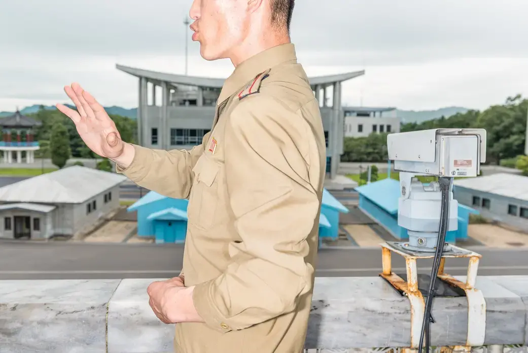 A military officer at the D.M.Z. This summer, the prospect of a nuclear confrontation between the United States and North Korea, the most hermetic power on the globe, entered a realm of psychological calculation reminiscent of the Cold War. Image by Max Pinckers/The New Yorker. North Korea, 2017. A military officer at the D.M.Z. This summer, the prospect of a nuclear confrontation between the United States and North Korea, the most hermetic power on the globe, entered a realm of psychological calculation reminiscent of the Cold War. Image by Max Pinckers/The New Yorker. North Korea, 2017.