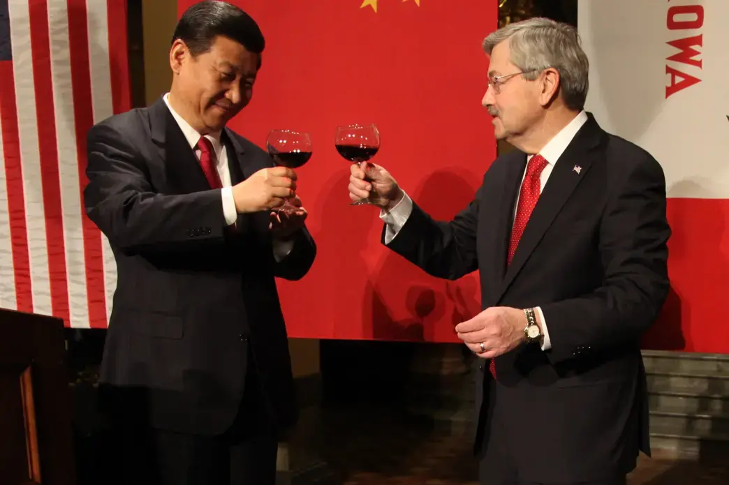 Chinese President Xi Jinping, left, shares a toast with U.S. Amb. Terry Branstad in February 2012 at the Iowa State Capitol in Des Moines. Xi, then vice president, and Branstad, then Iowa’s governor, first met in 1985 in Iowa. Image by Kelsey Kremer. United States, 2012. Chinese President Xi Jinping, left, shares a toast with U.S. Amb. Terry Branstad in February 2012 at the Iowa State Capitol in Des Moines. Xi, then vice president, and Branstad, then Iowa’s governor, first met in 1985 in Iowa. Image by Kelsey Kremer. United States, 2012.