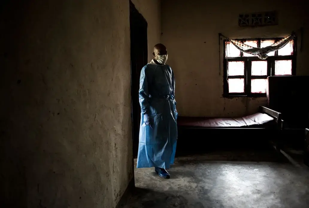 Health workers in a war-weary region are confronted with Ebola, a deadly virus that has claimed more than 2,000 lives. Image by John Wessels. Democratic Republic of Congo, 2019. Health workers in a war-weary region are confronted with Ebola, a deadly virus that has claimed more than 2,000 lives. Image by John Wessels. Democratic Republic of Congo, 2019.