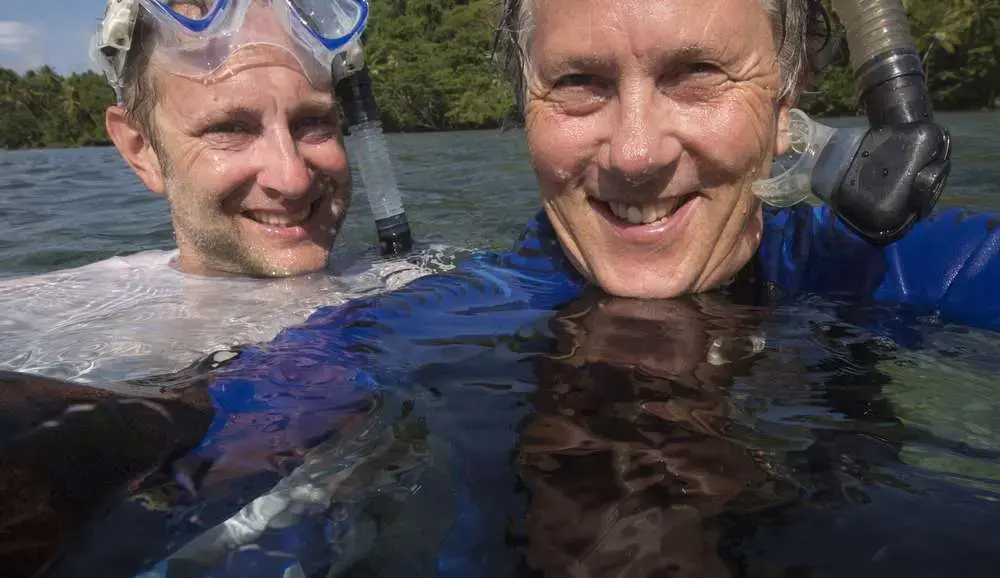 Seattle Times reporter Craig Welch, left, and photographer Steve Ringman in Papua New Guinea. Media file: c59dace356cae3eef019b86eb1b03908.jpg