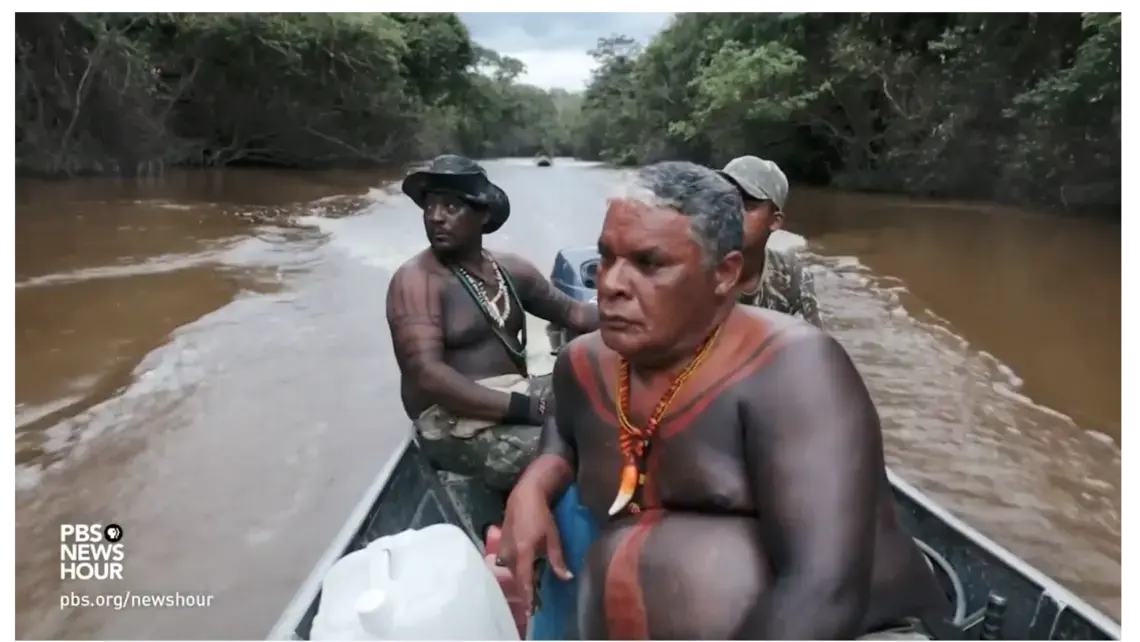 Guajira Indians who call themselves, The Guardians of the Forest and their leader Claudio Da Silva patrolling their ancestral lands. Image from PBS NewsHour. Brazil, 2018.