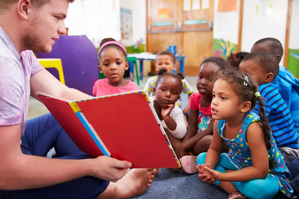 Nursery school children in South Africa are taught by a volunteer teacher. Image by Rex/Shutterstock. Nursery school children in South Africa are taught by a volunteer teacher. Image by Rex/Shutterstock.
