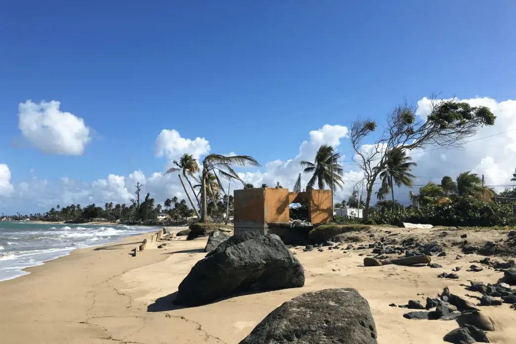 Erosion on the beach at Parcelas Suárez. Image by Kari Lydersen. Puerto Rico, 2019. Erosion on the beach at Parcelas Suárez. Image by Kari Lydersen. Puerto Rico, 2019.