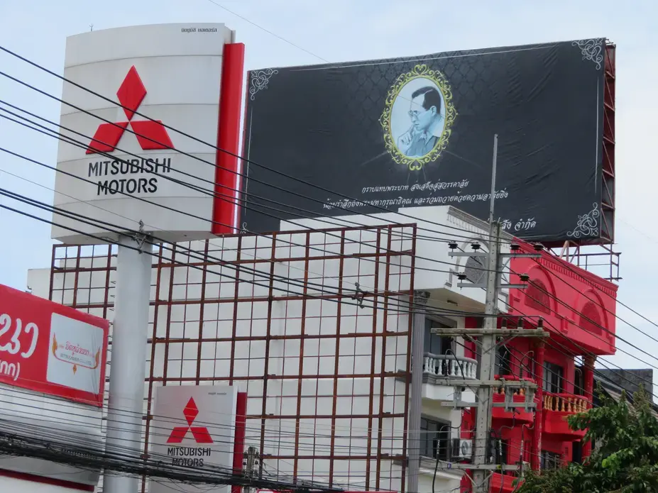 Though he died last year and has already been succeeded by his son, the image of Thailand's King Bhumipol Adulyadej is as ubiquitous as ever. Image by Richard Bernstein. Thailand, 2017.