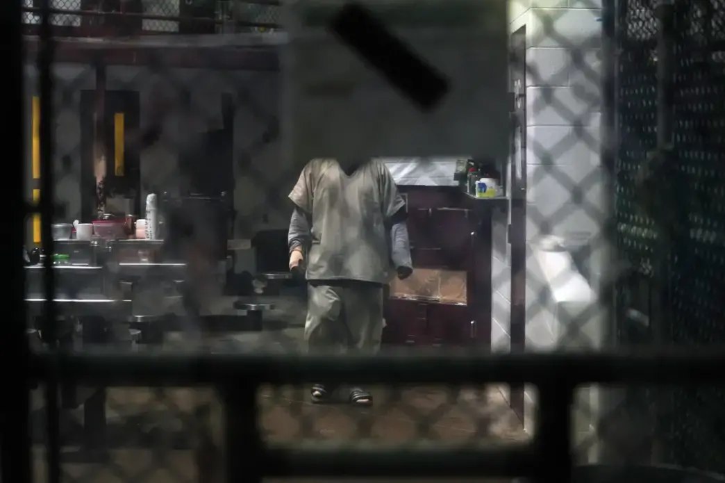 A communal cellblock for some of the 40 prisoners who are detained at Guantánamo Bay. Image by Doug Mills. United States, 2019.
