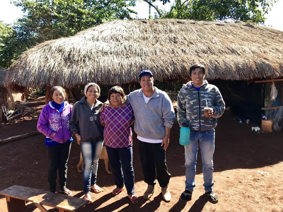 Cacique (chief) Ezequiel João Kaiowá (middle wearing a hat) and his family have waited since 2006 on the creation of an official Indigenous territory that will respects the historical boundaries of their village. Image by Rafael Lima. Brazil, 2019. Cacique (chief) Ezequiel João Kaiowá (middle wearing a hat) and his family have waited since 2006 on the creation of an official Indigenous territory that will respects the historical boundaries of their village. Image by Rafael Lima. Brazil, 2019.
