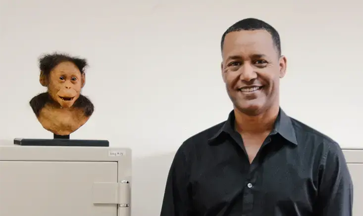 Paleoanthropologist Zeresenay Alemseged beside his discovery, a 3.3 million year old child, an early species in humankind’s lineage. “When you realize that you, as an individual, are part of a very long line, you begin to take it personally,” he said, “you really are afraid to cut off that line.” Image by Amy Maxmen. Ethiopia, 2014. Media file: 4344_3c7417b8df0daf23f39f445e740c7a43.png