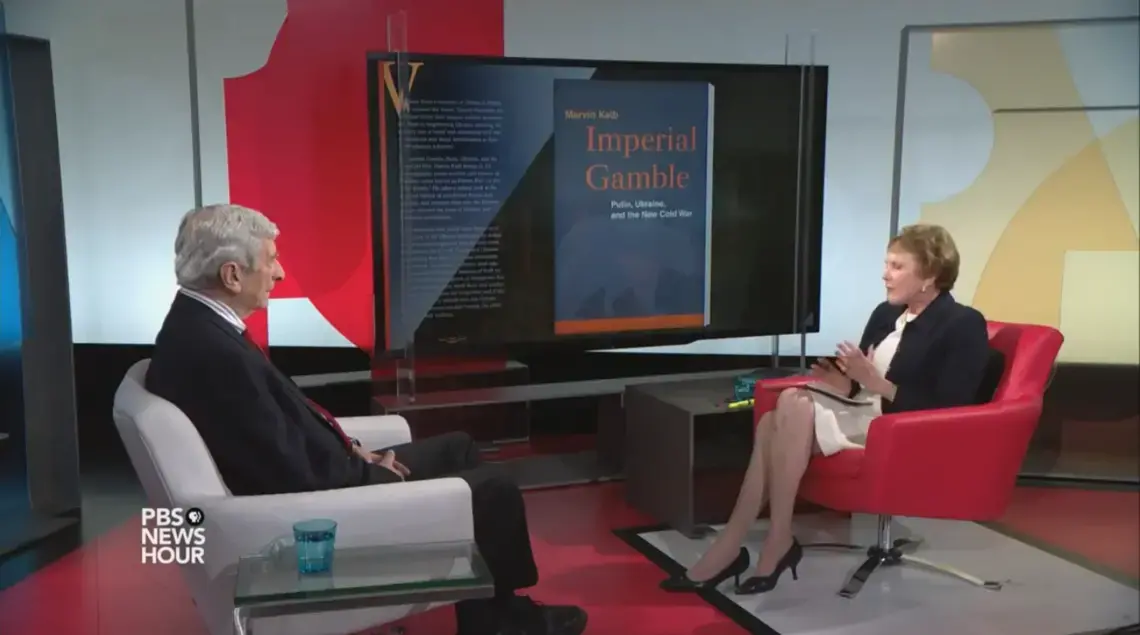 Margaret Warner interviews Marvin Kalb on his newest book, "Imperial Gamble: Putin, Ukraine and the New Cold War." Image courtesy of PBS NewsHour. Media file: screen_shot_2015-09-25_at_1.29.46_pm.png