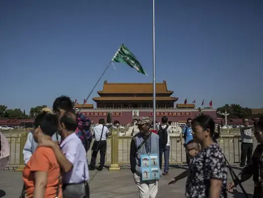 Tiananmen Square, located in the center of China's capital city, Beijing, is visited by huge numbers of people everyday. It's known worldwide for the deadly protests there in 1989. Image by Kelsey Kremer. China, 2017.