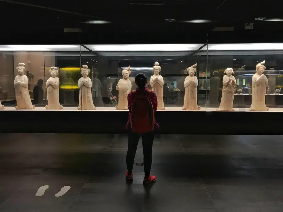 Visitors at a museum in Xi'an, a city known for its long history and rich intellectual life. Image by Sim Chi Yin. China, 2018.