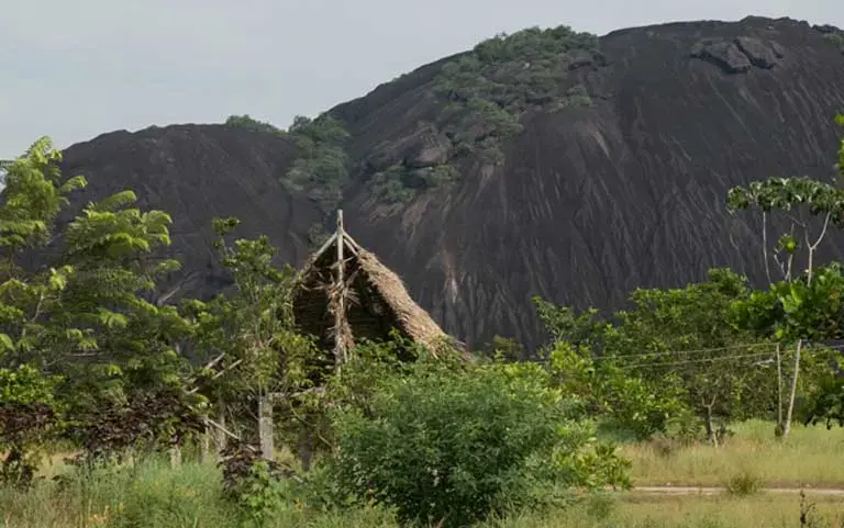 An indigenous community in the Parguaza region of Bolívar state, an area that boasts one the world’s most promising coltan deposits, a conflict mineral used widely in electronics products such as cell phones and computers. Image by Bram Ebus. Venezuela, 2017.