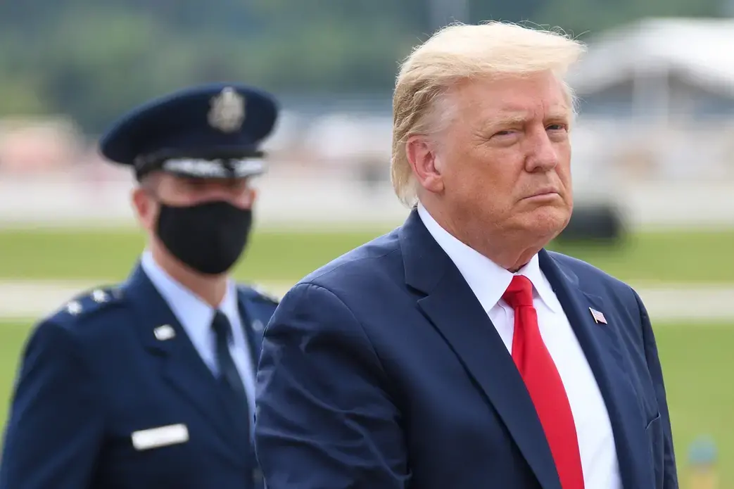 President Donald Trump walks to a limousine at Dobbins Air Reserve Base. Image by Evan El-Amin / Shutterstock. United States, 2020.