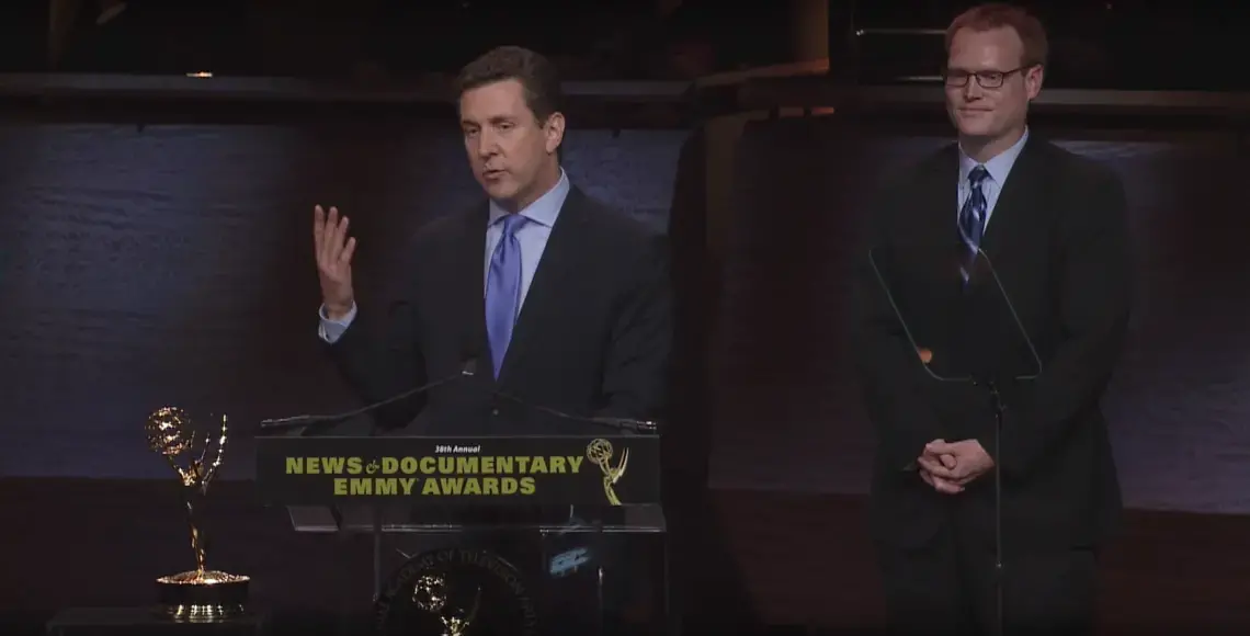 William Brangham (front) and Jason Kane (back) deliver the team's acceptance speech at the 38th Annual News and Documentary Emmy Awards. William Brangham (front) and Jason Kane (back) deliver the team's acceptance speech at the 38th Annual News and Documentary Emmy Awards.