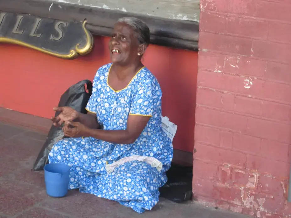 Blind woman sitting outside a shop in Colombo. Image by Ross Velton. Sri Lanka, 2015. Blind woman sitting outside a shop in Colombo. Image by Ross Velton. Sri Lanka, 2015.