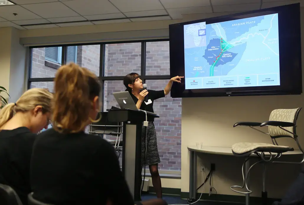 Pulitzer Center grantee Amy Maxmen talks to student fellows about reporting on the origins of mankind on her latest reporting trip in Ethiopia. Image by Meghan Dhaliwal. Washington, DC, 2014. Media file: 4.jpg