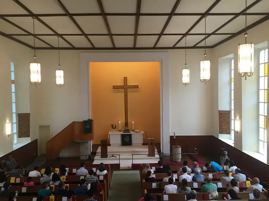 Visiting Trinity Church in Berlin one Sunday in July 2016. Half of the service was translated into Farsi. Image by Laura Kasinof. Germany, 2016. Visiting Trinity Church in Berlin one Sunday in July 2016. Half of the service was translated into Farsi. Image by Laura Kasinof. Germany, 2016.