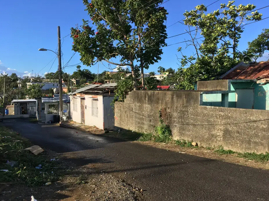 A row of houses in Guayama, destroyed and unfixed six months after Hurricane Maria. Image by Isabel S. Dieppa. Puerto Rico, 2017. A row of houses in Guayama, destroyed and unfixed six months after Hurricane Maria. Image by Isabel S. Dieppa. Puerto Rico, 2017.