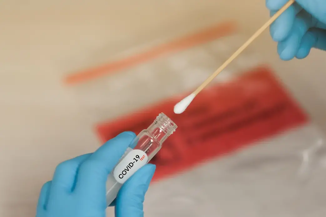 COVID-19 nasal swab test in hospital lab. Image by Horth Rasur / Shutterstock. 2020. COVID-19 nasal swab test in hospital lab. Image by Horth Rasur / Shutterstock. 2020.