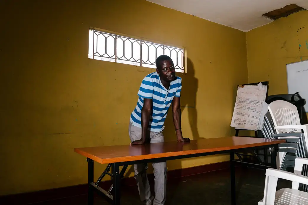 Leticia Opio, an out transgender woman and founder of the LGBT advocacy group Queer Youth Uganda, poses for a portrait at the QYU offices. On the morning of Christmas Eve 2016, someone broke into Opio's home and attacked her from behind, slamming her head into the wall until she was unconscious. In the intervening weeks, she has suffered from memory loss, nightmares and general anxiety. Image by Jake Naughton. Uganda, 2017. Leticia Opio, an out transgender woman and founder of the LGBT advocacy group Queer Youth Uganda, poses for a portrait at the QYU offices. On the morning of Christmas Eve 2016, someone broke into Opio's home and attacked her from behind, slamming her head into the wall until she was unconscious. In the intervening weeks, she has suffered from memory loss, nightmares and general anxiety. Image by Jake Naughton. Uganda, 2017.