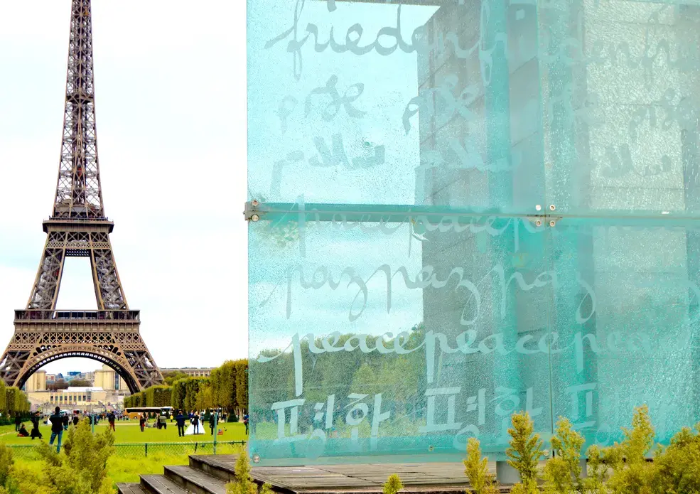 On the Wall of Peace, erected near the base of the Eiffel Tower in 2000, the word ‘peace’ is inscribed in 49 different languages. The monument and its inscriptions are a call for action towards meaningful inclusion and a more peaceful reality. Image by Charlotte Bellomy. France, 2015. Media file: 15_years_of_promoting_peace.jpg
