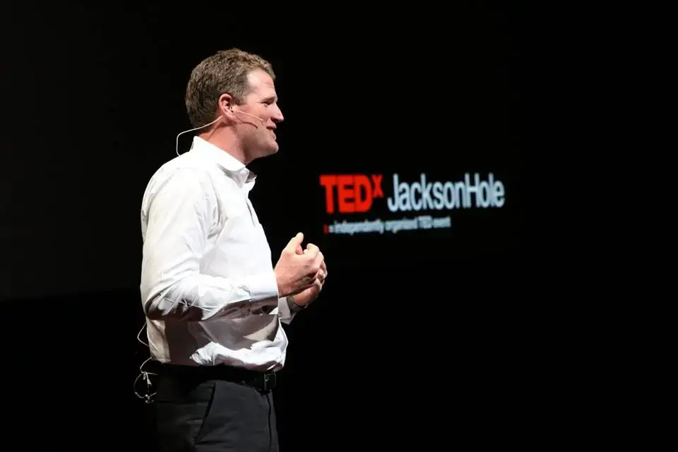 Speaking before a TEDX audience in Jackson Hole the day after the eclipse. Screenshot courtesy Erik Vance. United States, 2017.