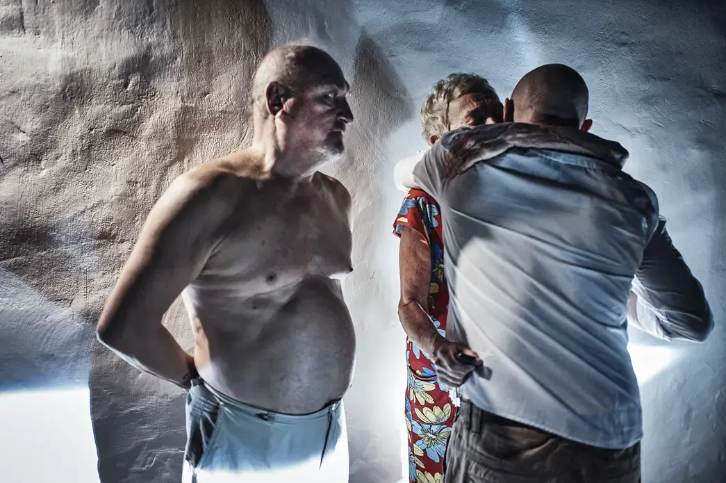 Yegor hugs his parents goodbye before going on a twelve-hour drive to Kiev. Image by Misha Friedman. Sevastopol, 2014. Media file: crimea-1-edit.jpg