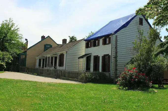 19th-century houses in formerly Weeksville town, preserved as part of the Weeksville Heritage Center, offer a glimpse into Brooklyn's past. Image by Lennox Wright / Shutterstock. United States, 2019.