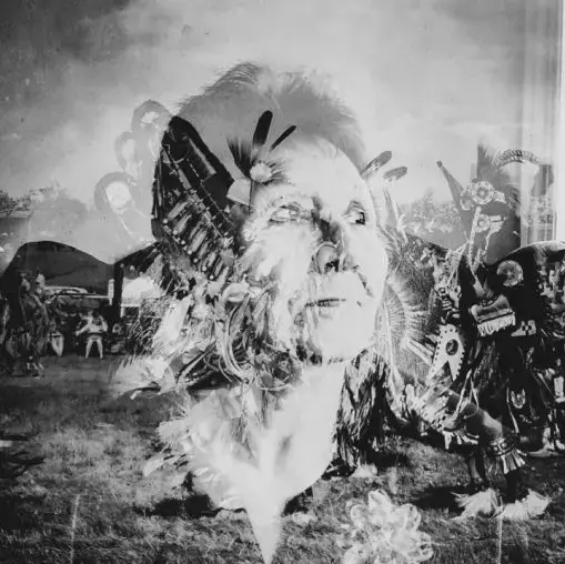 Double exposure photography of Rosalie Sewap, which is part of Daniella Zalcman's "Signs of Your Identity" reporting project. Sewap attended the Guy Hill Indian Residential School (1959–1969): “We had to pray every day and ask for forgiveness. But forgiveness for what? When I was 7 I started being abused by a priest and a nun. They’d come around after dark with a flashlight and would take away one of the little girls almost every night. You never really heal from that. I turned into an alcoholic and it’s taken me a long time to escape that. I can’t forgive them. Never.” Image by Daniella Zalcman. Canada, 2015. Media file: rosalie_sewap-daniella_zalcman-identity.jpg