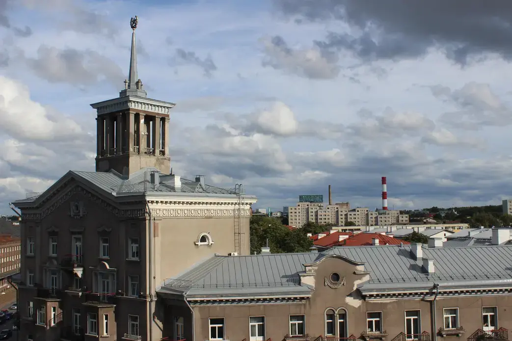 A Soviet-style residential building from the Stalinist Era topped with a spire and the Star of Communism. Image by Hani Zaitoun. Estonia, 2019. A Soviet-style residential building from the Stalinist Era topped with a spire and the Star of Communism. Image by Hani Zaitoun. Estonia, 2019.
